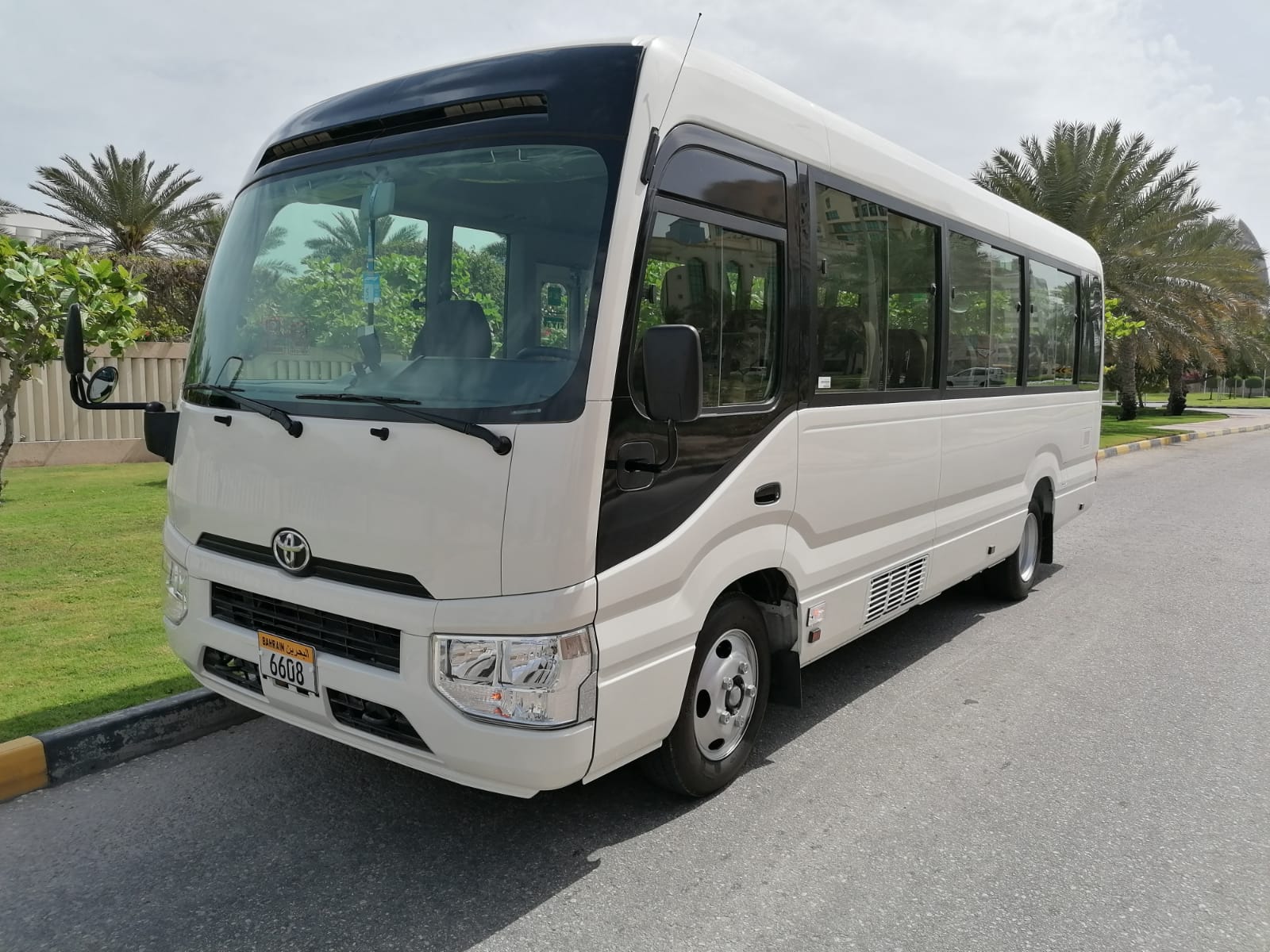 Toyota Coaster - Mini Bus - Tourist passenger bus - Group transportation